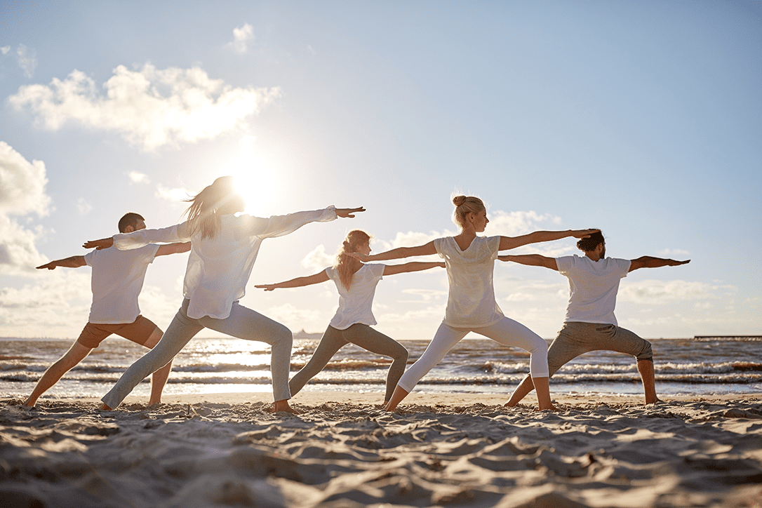 yoga class on the beach