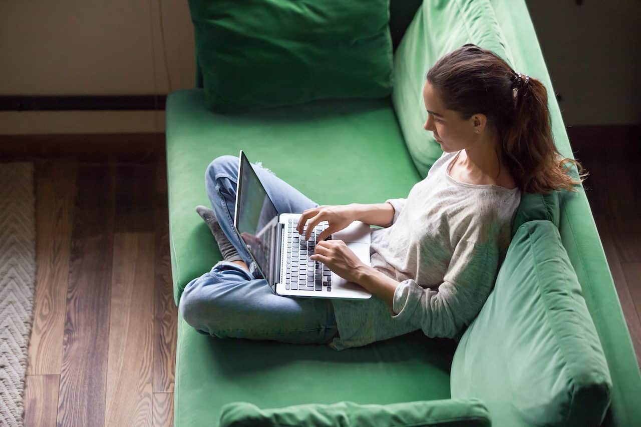 Site Search woman using her laptop